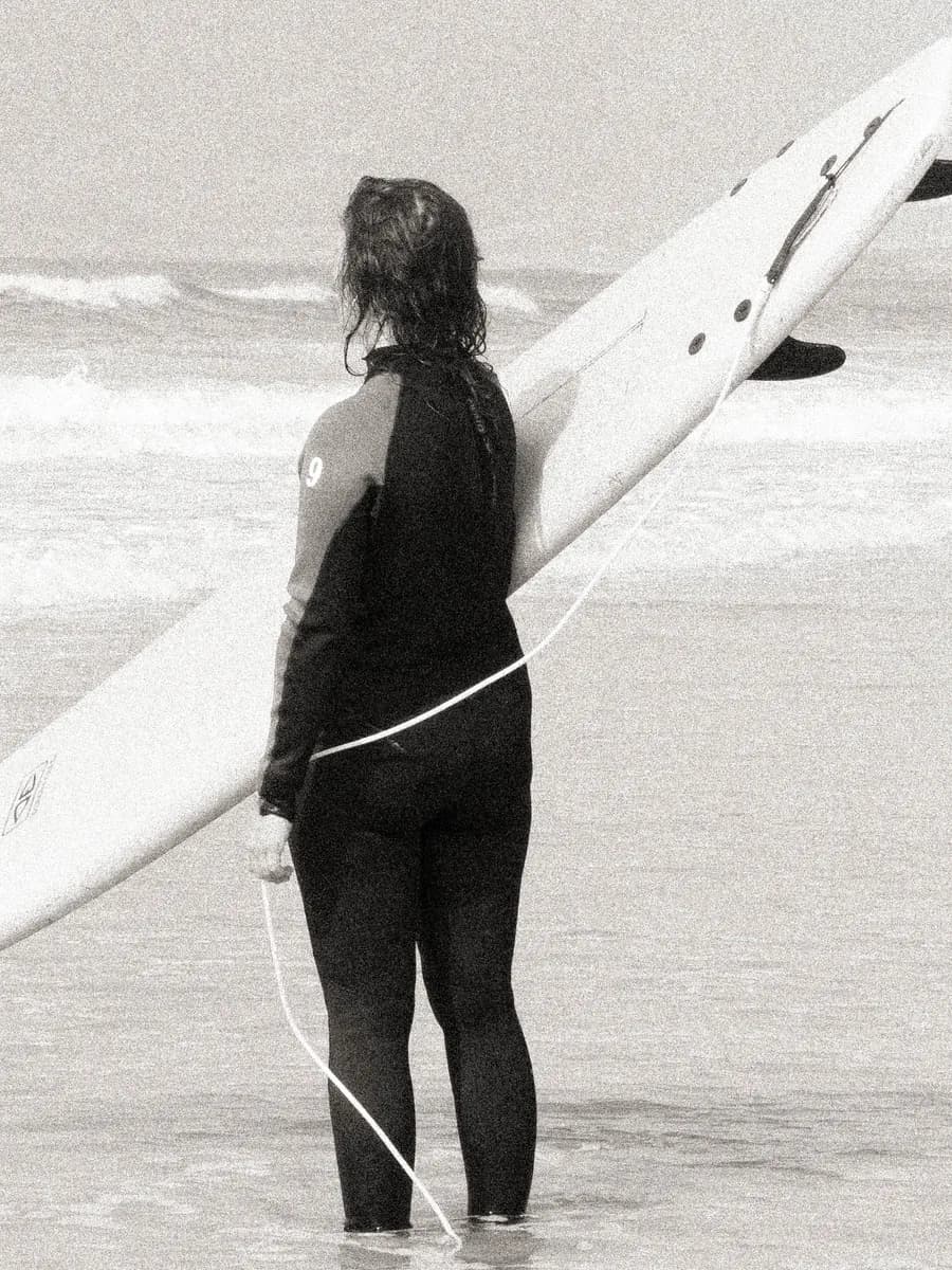 Surf lesson debrief on the sand in Tamraght