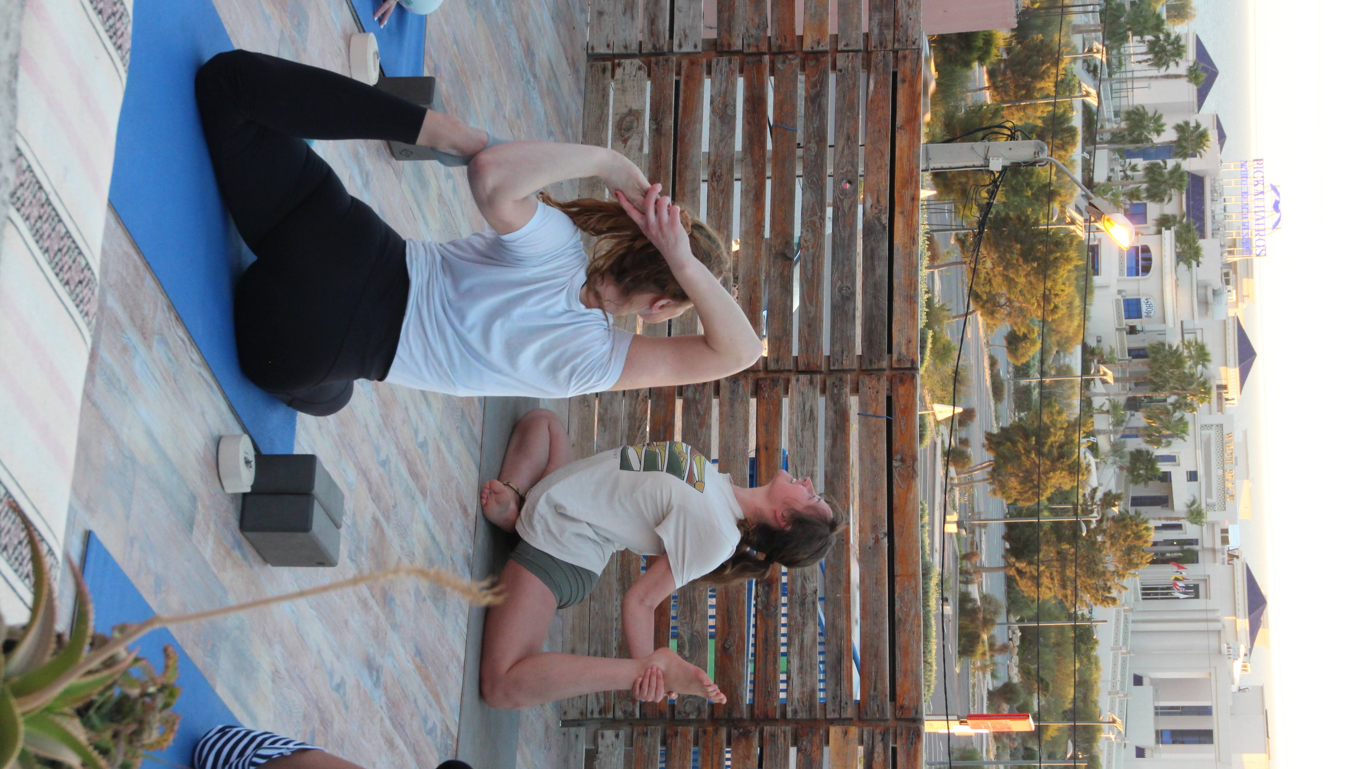 Person practising yoga in warm morning light
