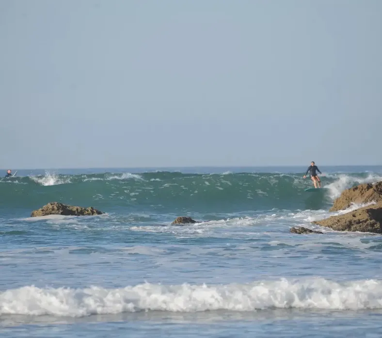 The right-hand point break at Banana Point breaking over the reef